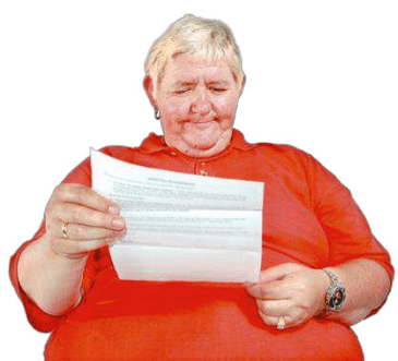 person looking at a piece of paper